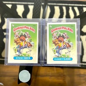 Topps garbage pail kids trading cards.